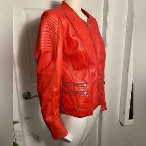 Beautiful Orange Danier Leather Moto style jacket